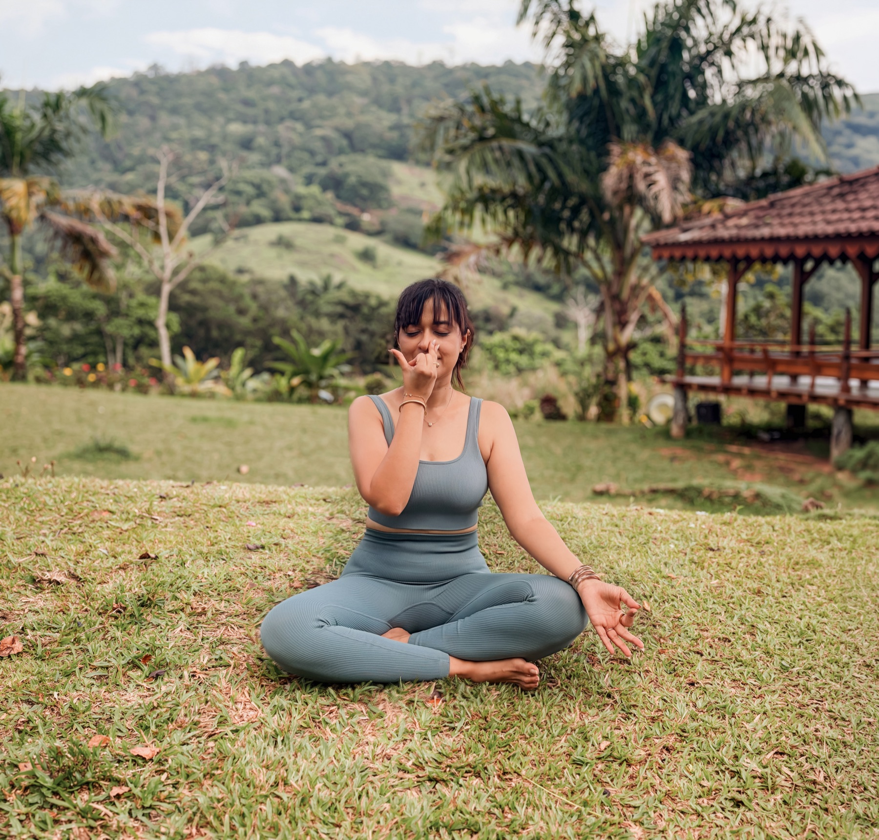 Palasha practising mindful breathing outdoors